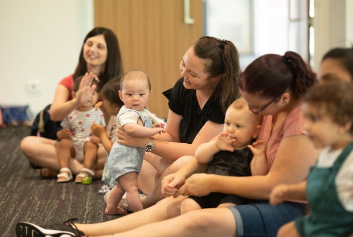 Babies and parents enjoying stories at the library