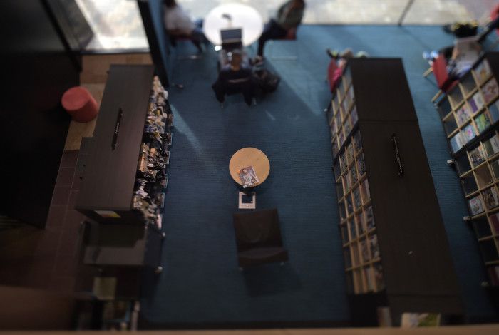 Image: overhead photo looking down into the magazine reading area