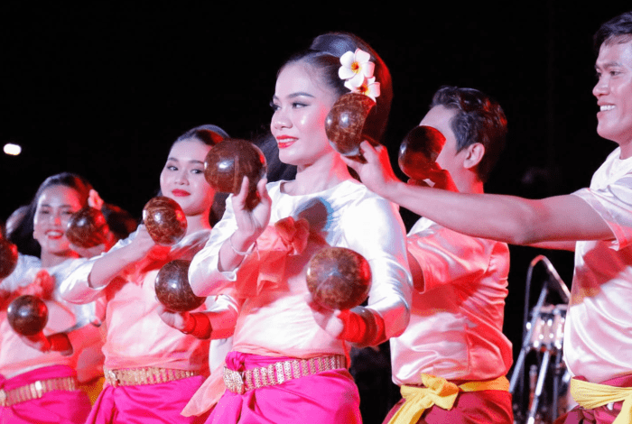 Dancers in costume in a traditional Cambodian event.