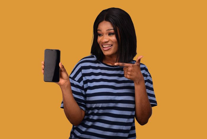 A woman looking at her mobile phone.