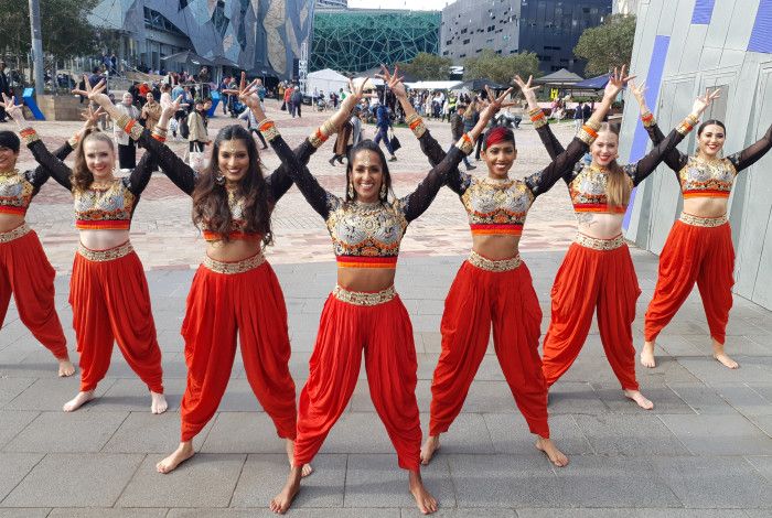 A group of Bollywood dancers in action.