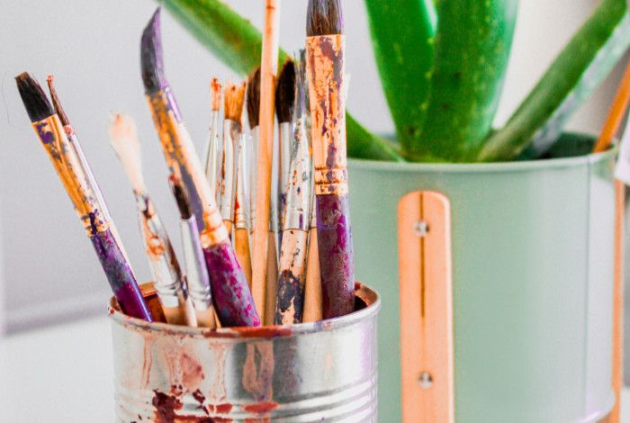 Paint brushes and plant