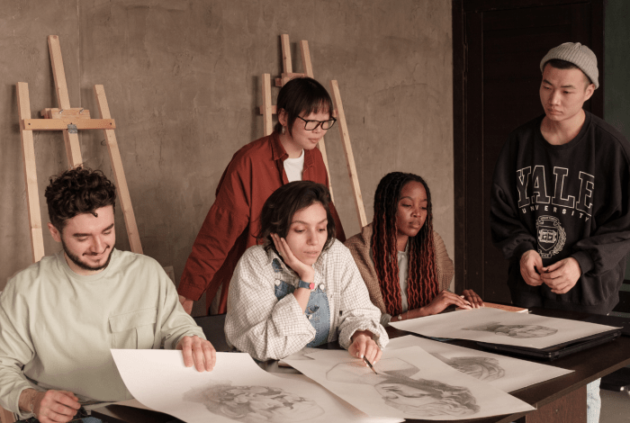 A group of young artist working on a project.