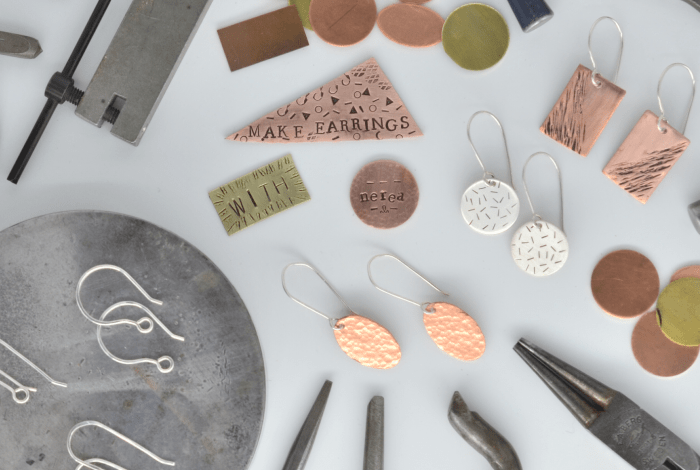 Silversmithing tools and assorted earrings.
