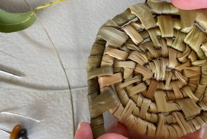 Woven artefact in progress.