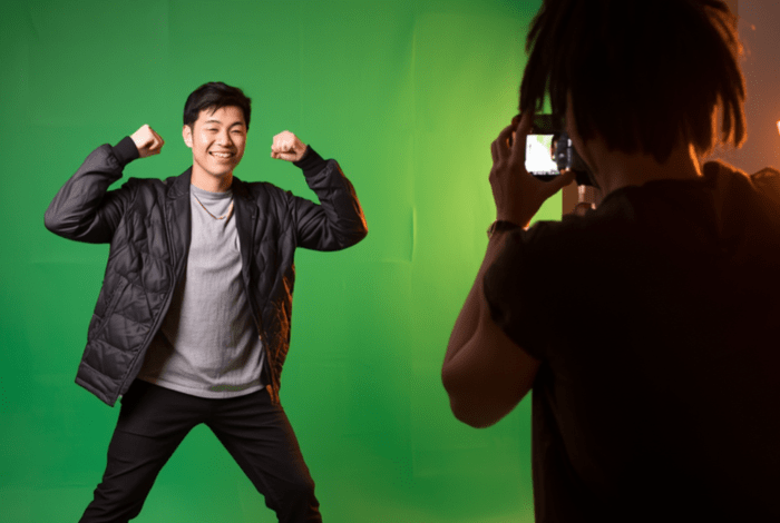 a photography or video production setup using a green screen backdrop