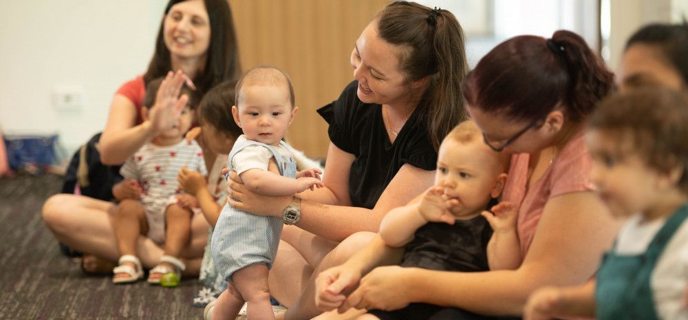 Babies and parents enjoying stories at the library