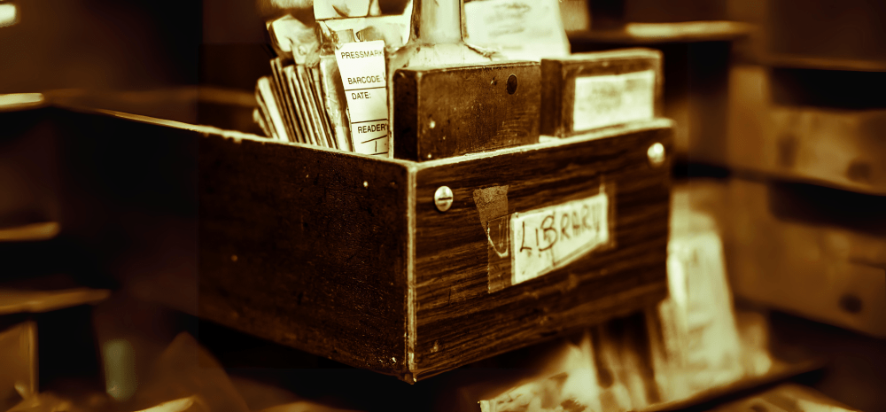 An old fashioned library card cataloguing system. The word Library appears.