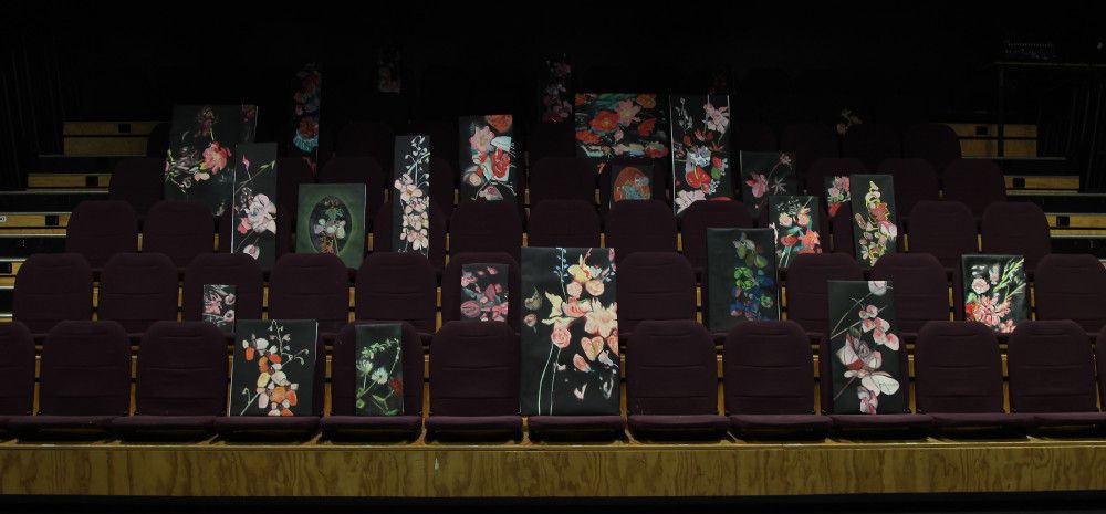 Floral paintings displayed on seating in the Engine Room, Bendigo. 