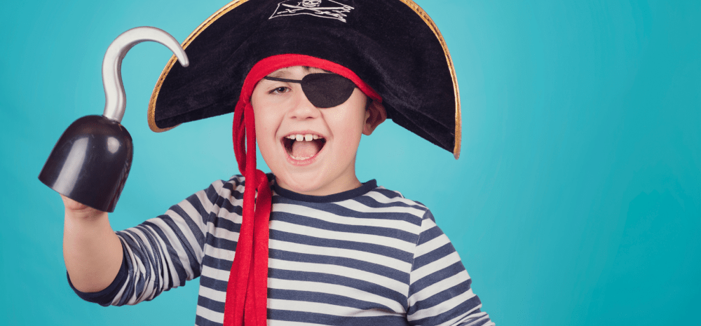 a child with pirate costume.
