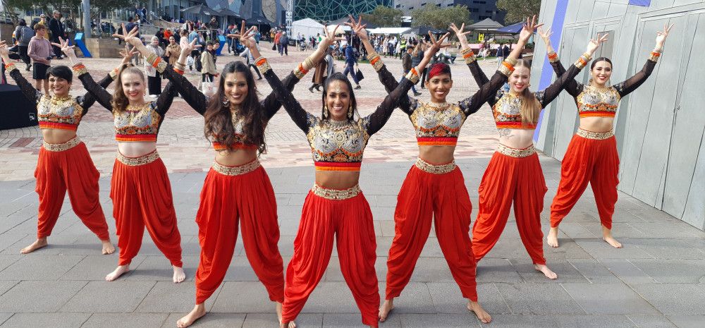 A group of Bollywood dancers in action.