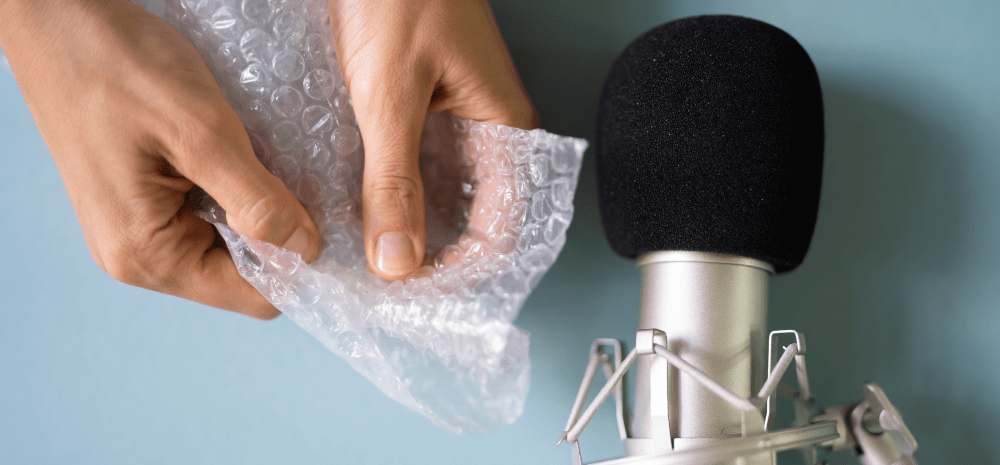 Microphone recording the sound of a bubble wrap being pressed.