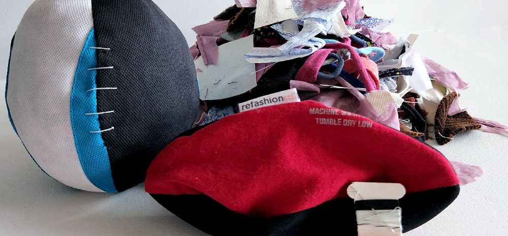 Two fabric footballs and assorted fabrics.