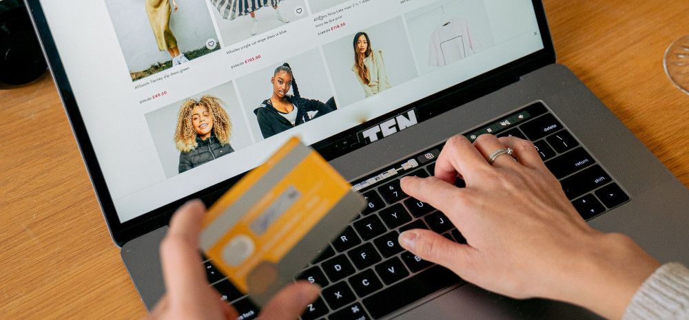 Someone making a suspicious online purchase with credit card.