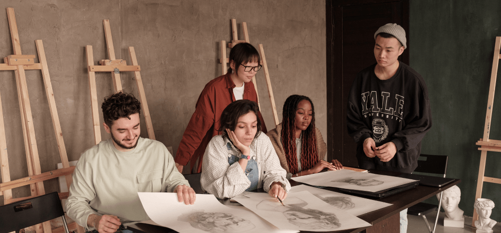 A group of young artist working on a project.