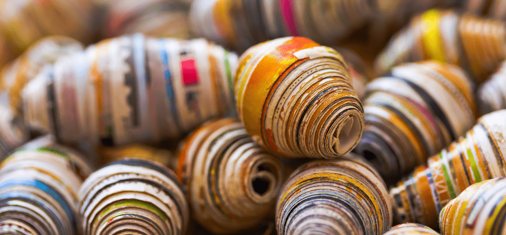 A pile of colourful paper beads. 
