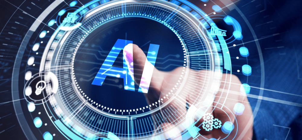 A person touching a transparent screen displaying an image of a circle with letters AI displayed in the middle of it. 