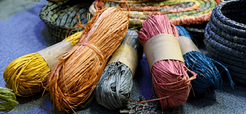 Colourful natural fibres and woven baskets used for First Nations weaving.