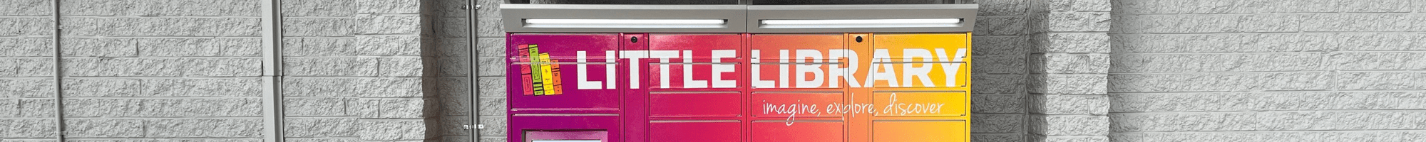 A set of brightly coloured lockers with the words Little Library across the top.