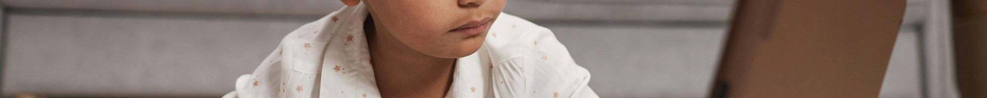 Child using an ipad.