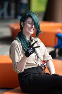 A person cosplaying a Pokemon trainer.