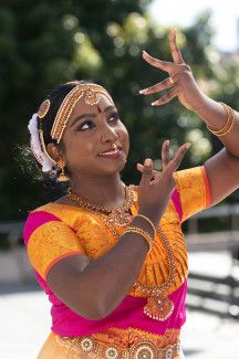 A dancer wearing a traditional costume. 