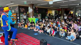 Children being entertained in the library.
