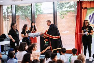 Library staff are awarded prizes by Mayor Cr Jim Memeti at the BIG Summer Read Finale.