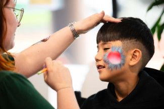 Facepainting in progress at Dandy-Con.