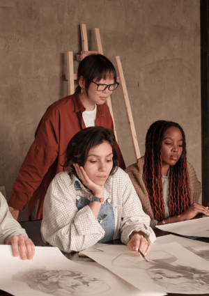 A group of young artist working on a project.