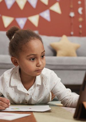 Child using an ipad.